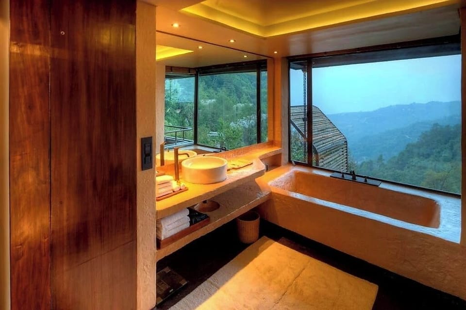 Separate tub and shower, hair dryer, bathrobes, slippers