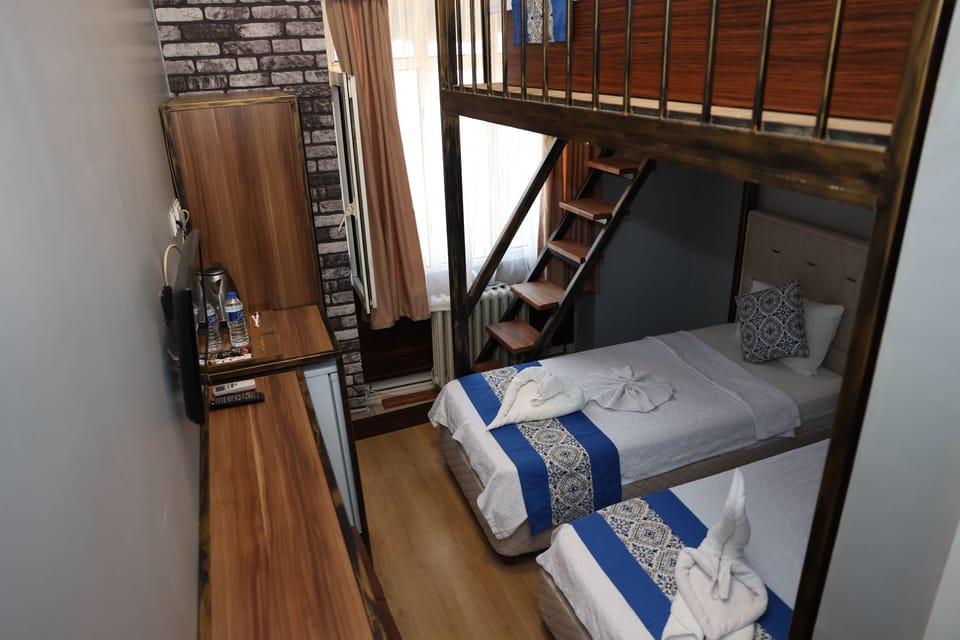 Deluxe Triple Room | Free minibar items, free WiFi, bed sheets