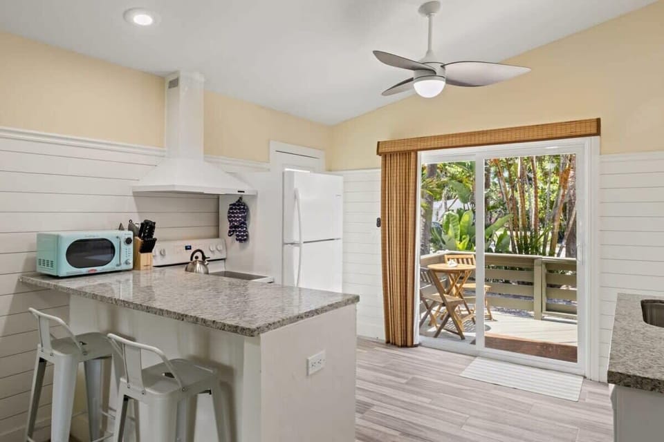 Renovated kitchen with island with plenty of space for preparing your meals