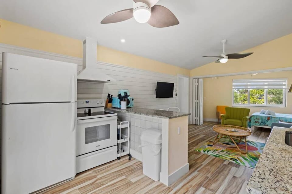 Renovated kitchen with island with plenty of space for preparing your meals