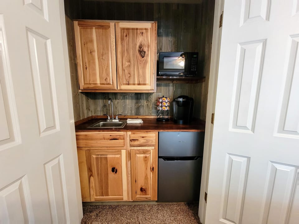 Bedroom Suite (located above game room) with ensuite bath and coffee bar