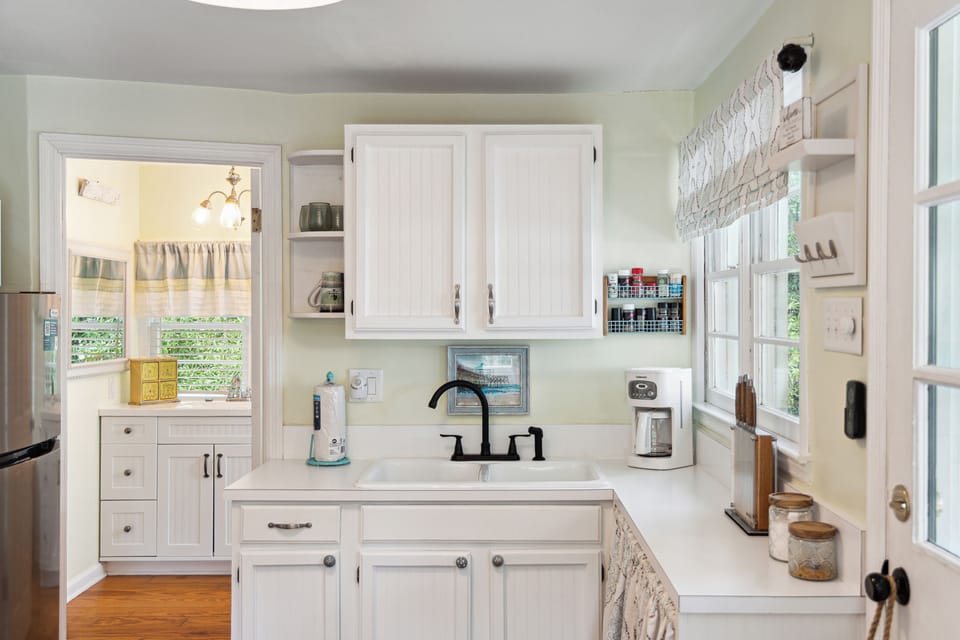Kitchen is fully equipped for meals at home.