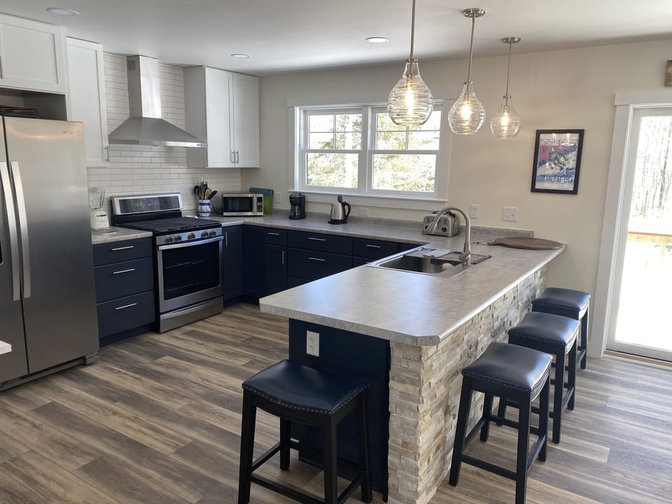 Kitchen open to living and dining rooms