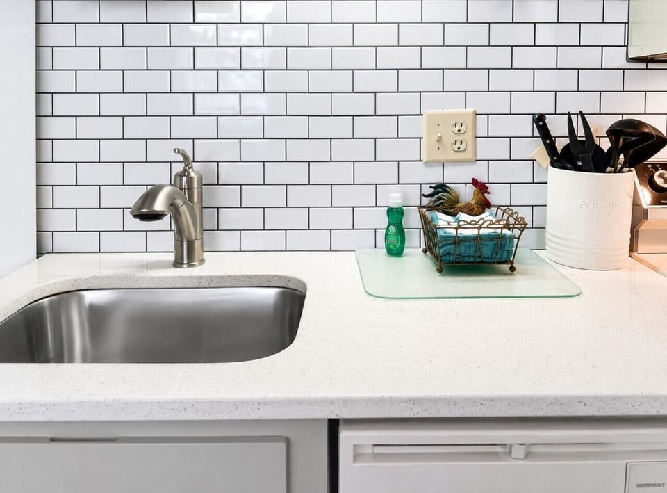 Remodeled kitchen is fully-equipped with pots, pans & utensils.
