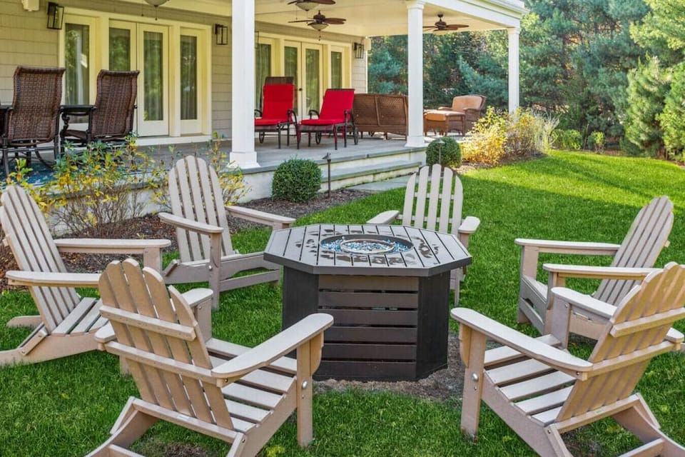 Relax by the outdoor gas firepit with six cozy lounge chairs, perfect for enjoying fresh air and evening conversations.