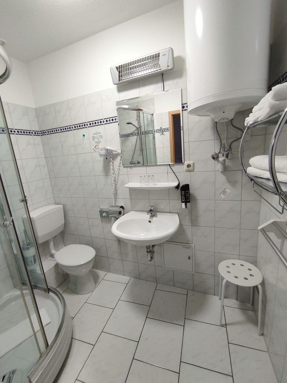Double Room | Bathroom | Shower, hair dryer, towels, soap