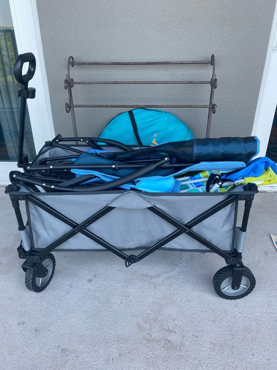 Wagon with beach chairs and sand toys to use during your stay. 