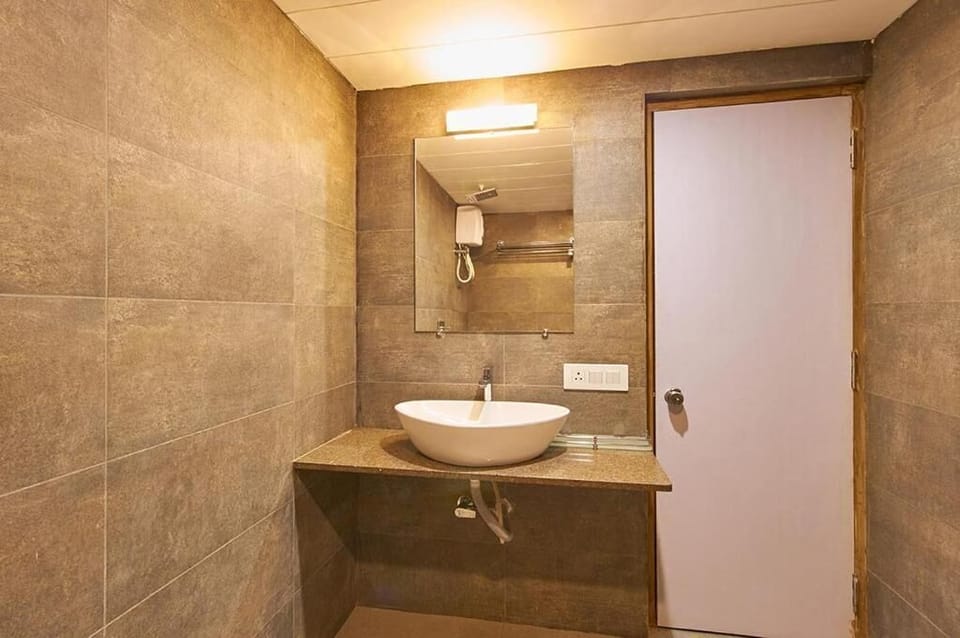 Shower, hair dryer (on request), towels