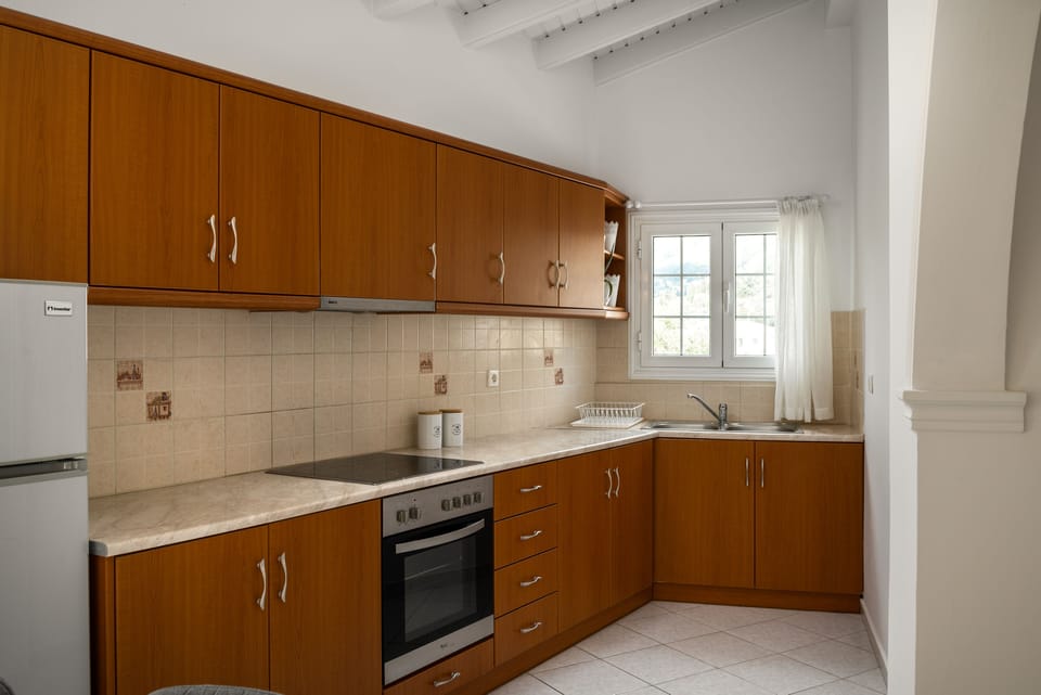 Apartment | Private kitchen | Fridge, oven, stovetop, espresso maker
