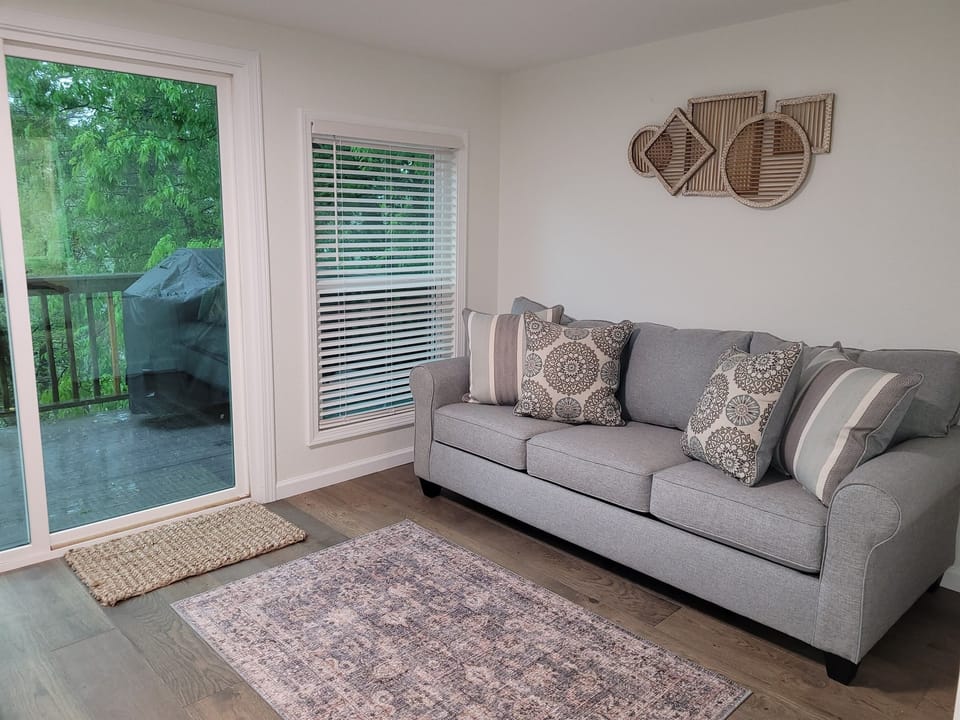 Queen Sleeper Sofa Adjacent to Master Bedroom #2 - Other Side of Work Space with Deck Access.