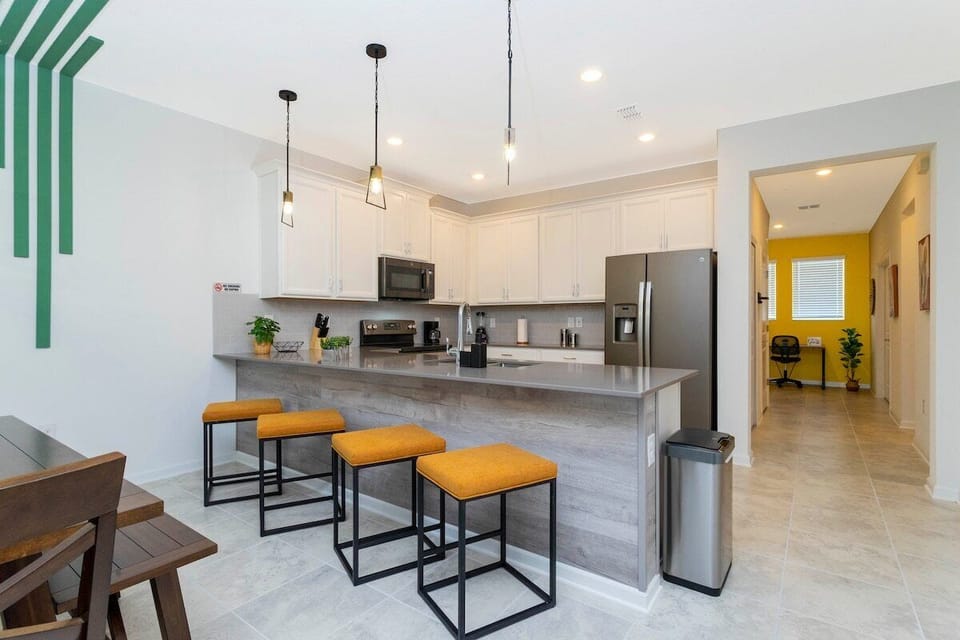Fall in love for modern luxury with our stunning open kitchen—a beautiful, vibrant space that seamlessly combines style and functionality. a family-friendly retreat where the joy of cooking meets the warmth of togetherness.