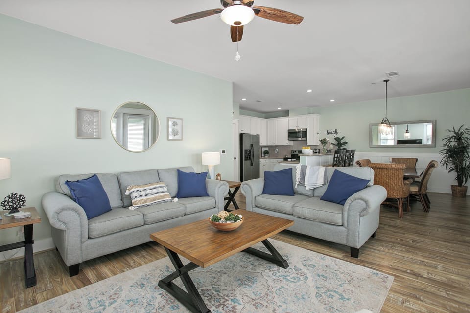 Spacious open floor plan with ocean views from living, dining & kitchen.