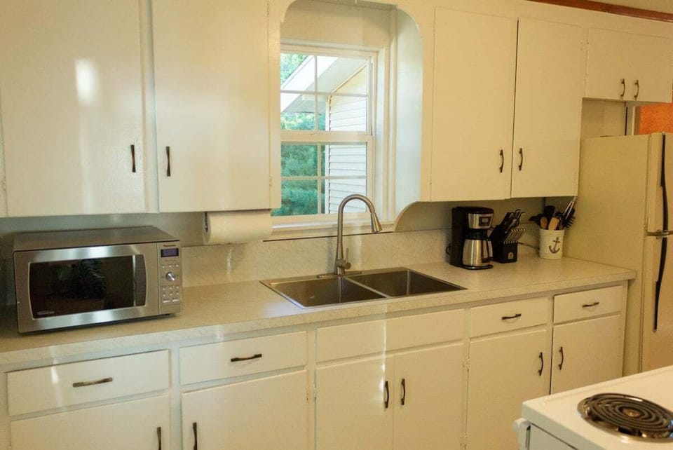 Sunny kitchen with plenty of counter space.