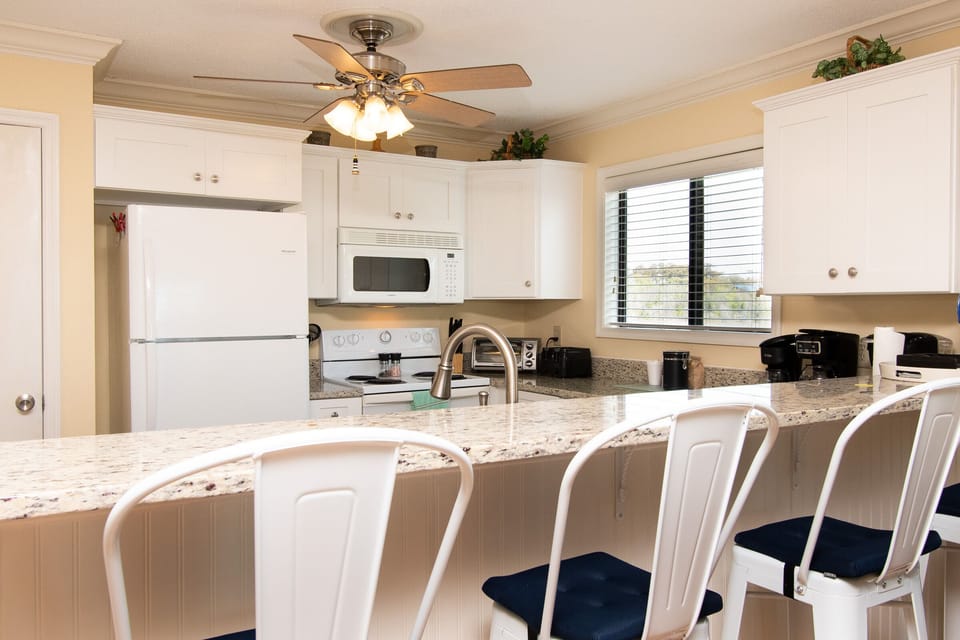 Bar Seating and Kitchen