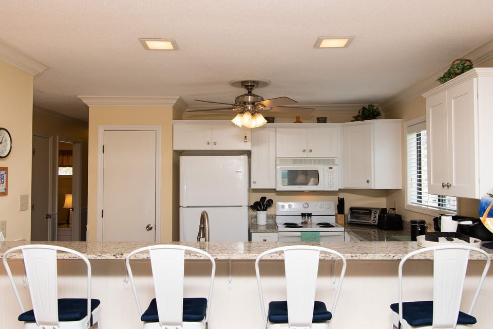 Bar Seating and Kitchen