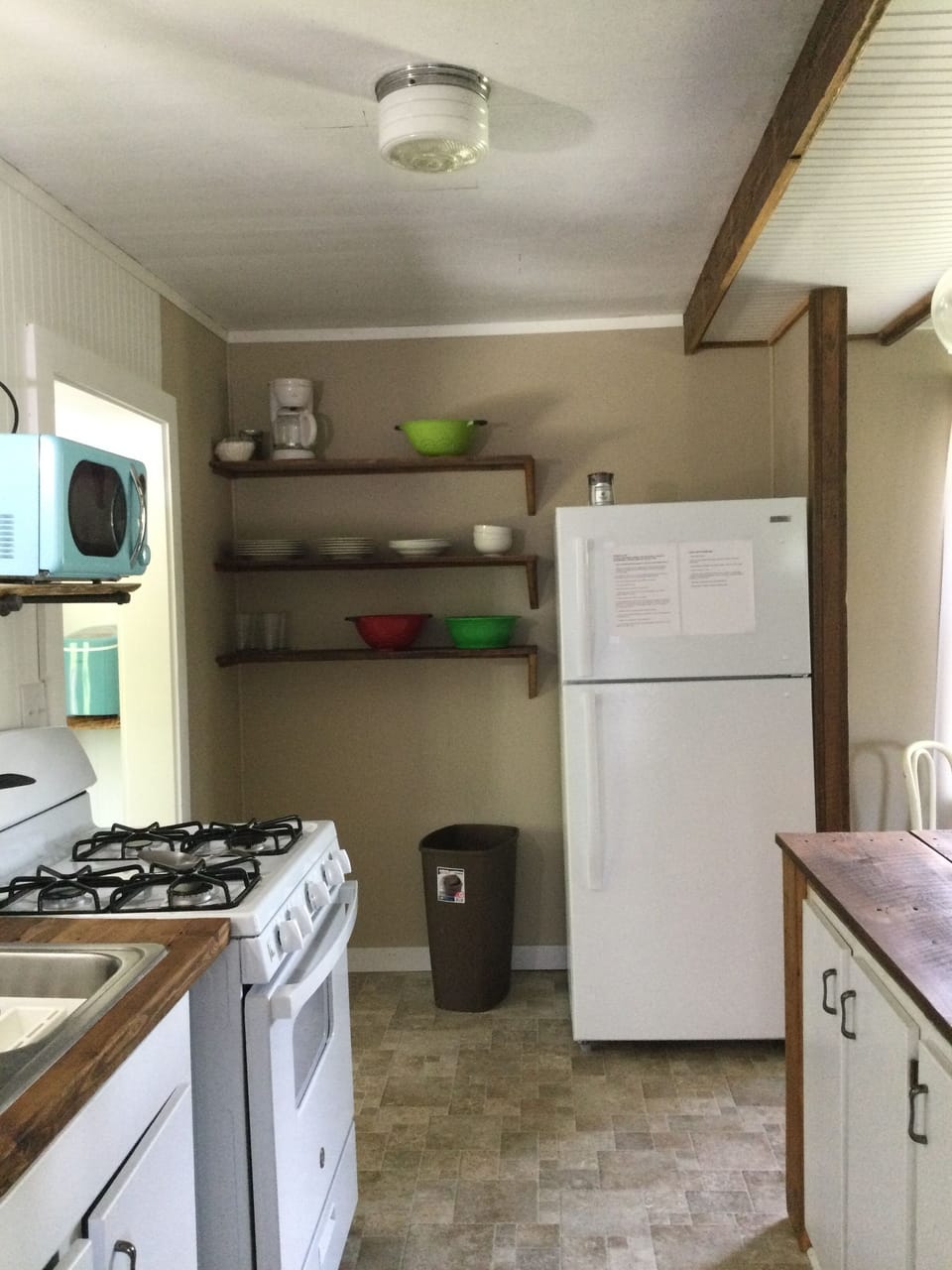Fully stocked kitchen with gas stove