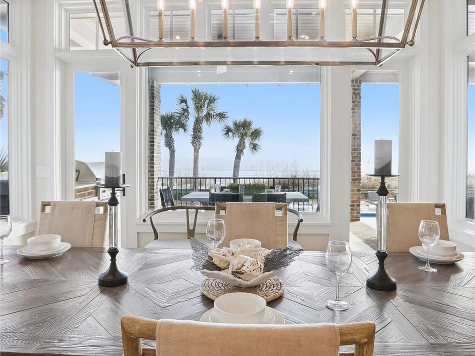 Beautiful Formal Dining Area with Oceanfront Views at 17 Grey Widgeon