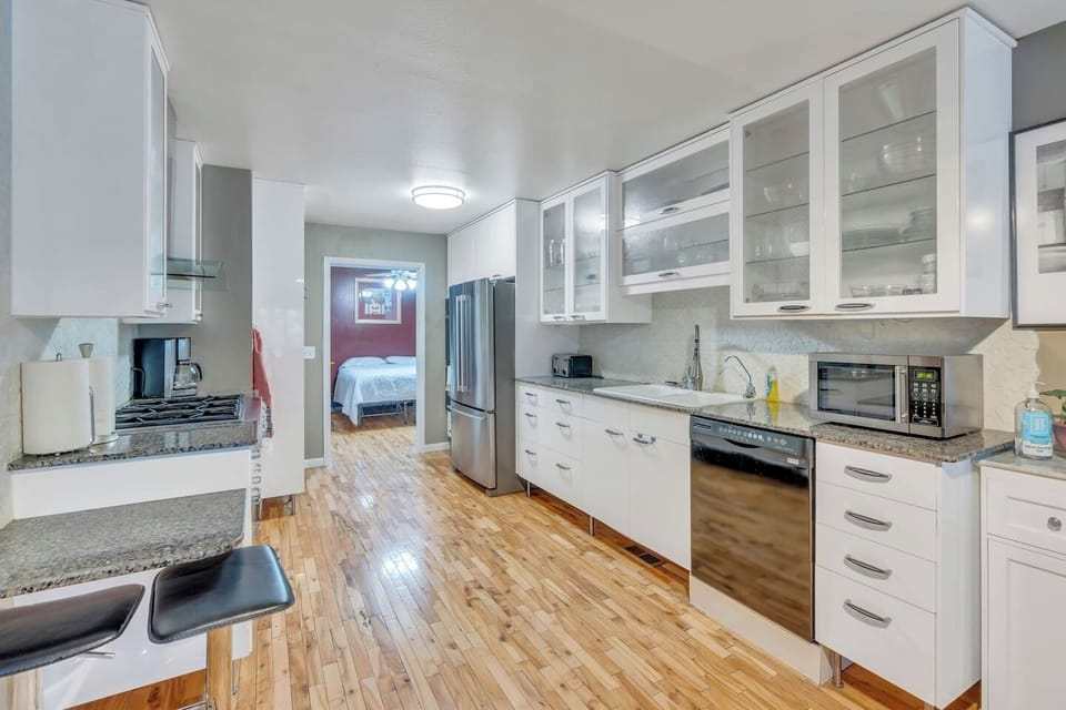 Main floor kitchen, open floor plan off dining area.  Fully equipped.
