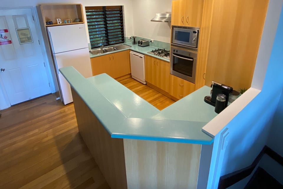 Spacious fully equipped kitchen with ample bench space
