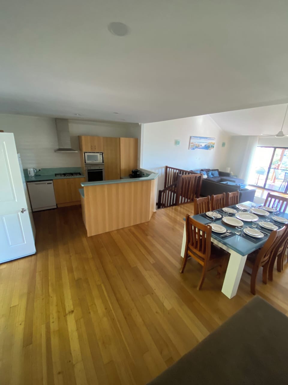 Fully equipped kitchen with dining area in open-plan layout