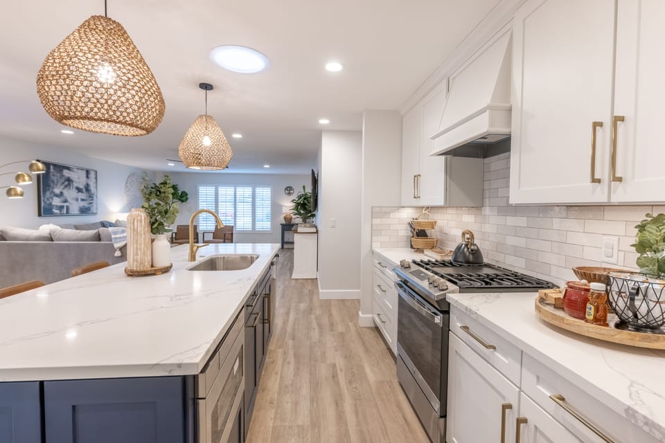 Fully equipped kitchen, gas range, eat in island with seating.