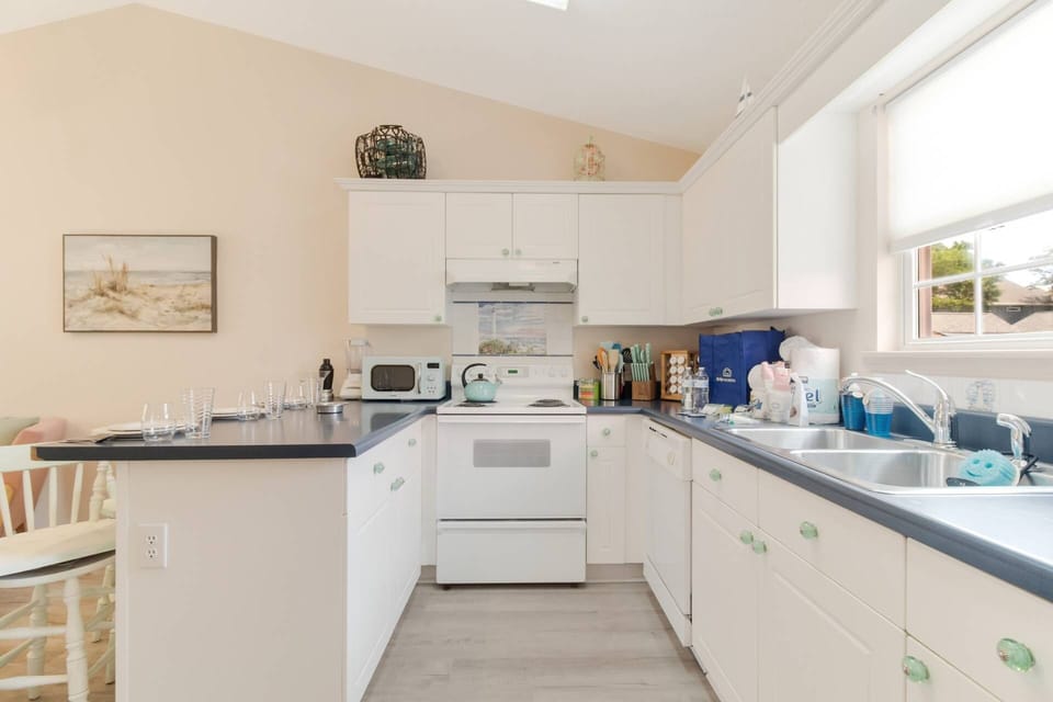 Large open kitchen with bar stools