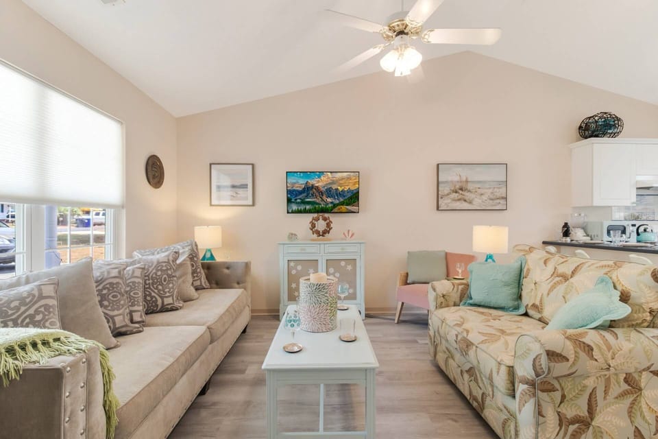 Comfortable family room leading to dining area and kitchen