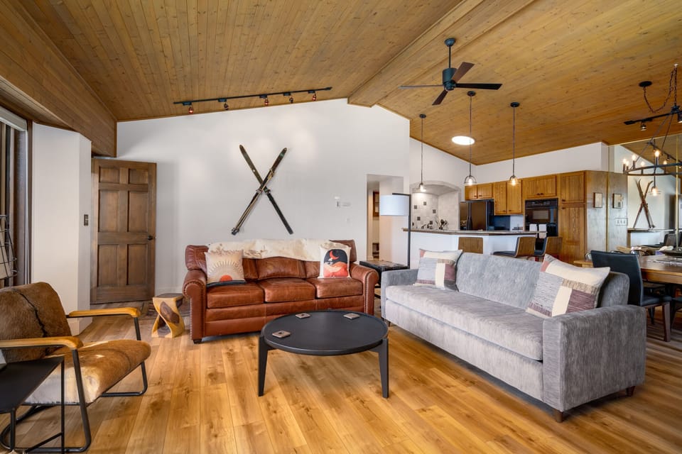 Living room with South Valley views with new furnishings and flooring