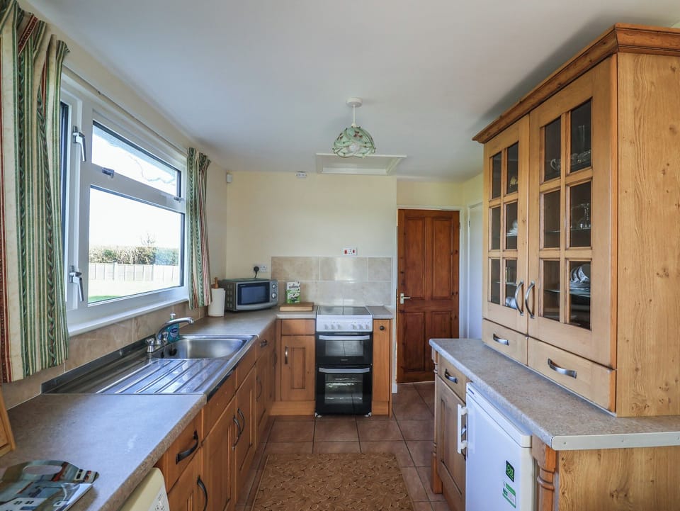 Fridge, microwave, electric kettle, toaster