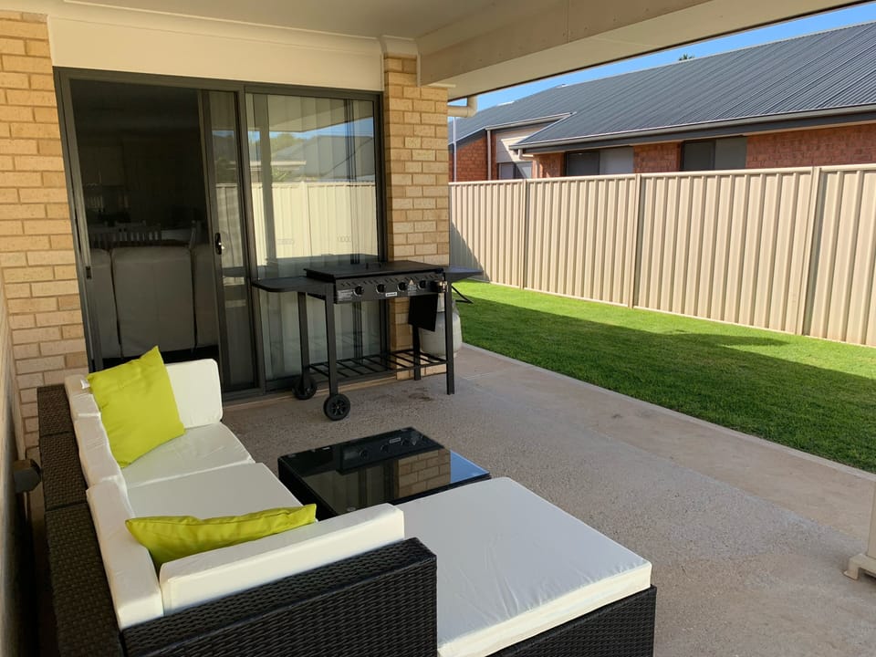Alfresco area and flat plate BBQ. Just add people and meat.