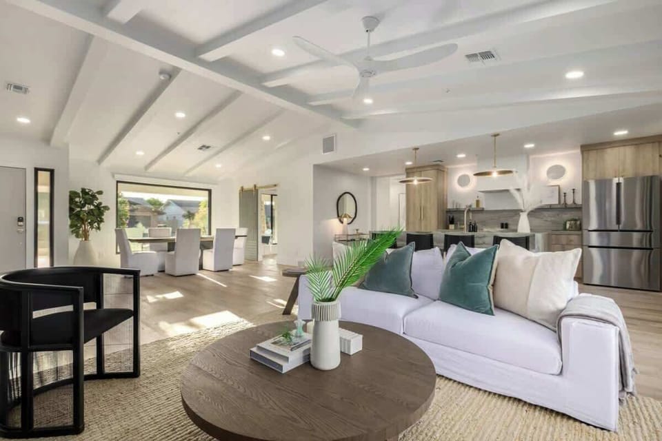 Open Concept with Vaukted Ceilings and Exposed Beams