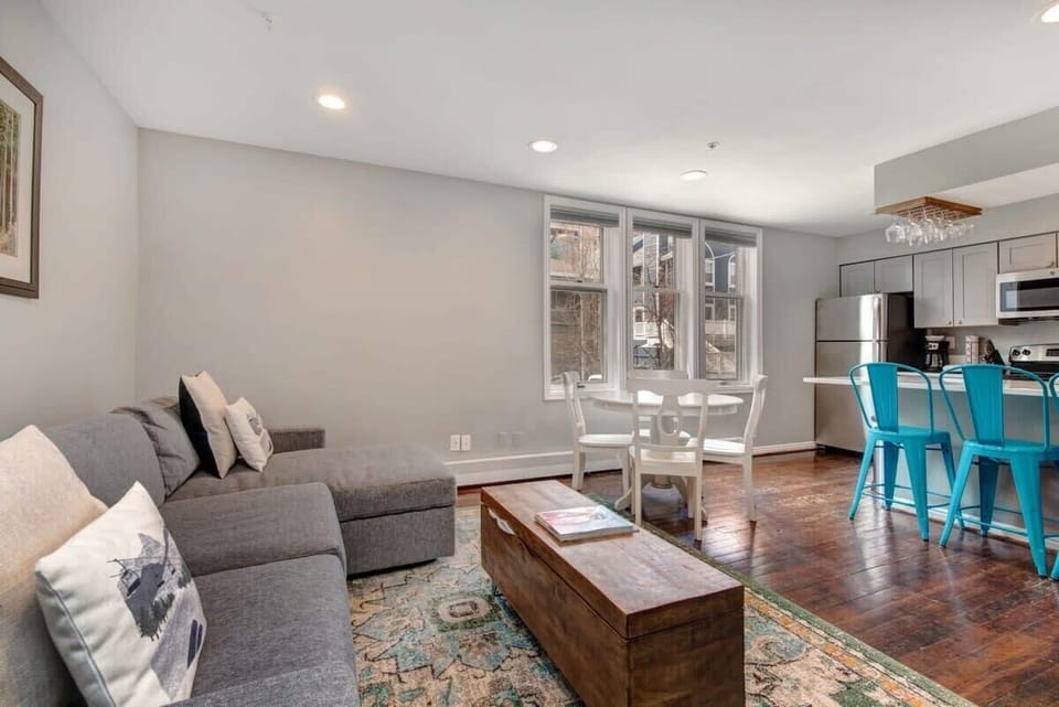 The open-concept living, kitchen and dining area is bathed in natural light and full of style. The layout makes it easy to stay connected with your loved ones regardless of your activity of choice.