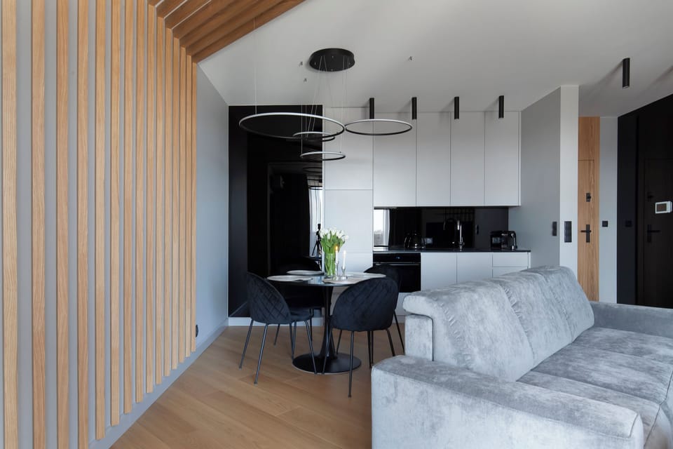 Exclusive Apartment | Living area | 50-inch plasma TV with cable channels, TV