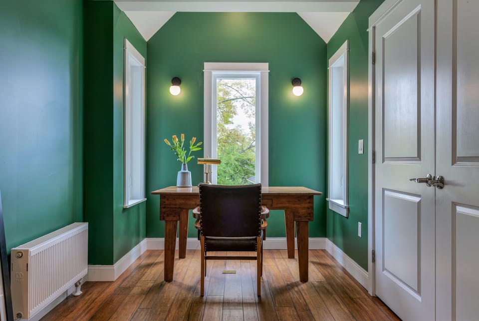 A dedicated upstairs office provides a quiet place to work during longer stays