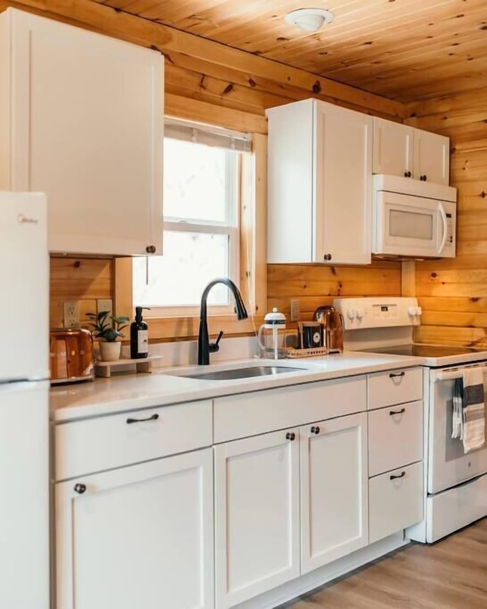 Kitchen with stove, microwave, kettle and more!