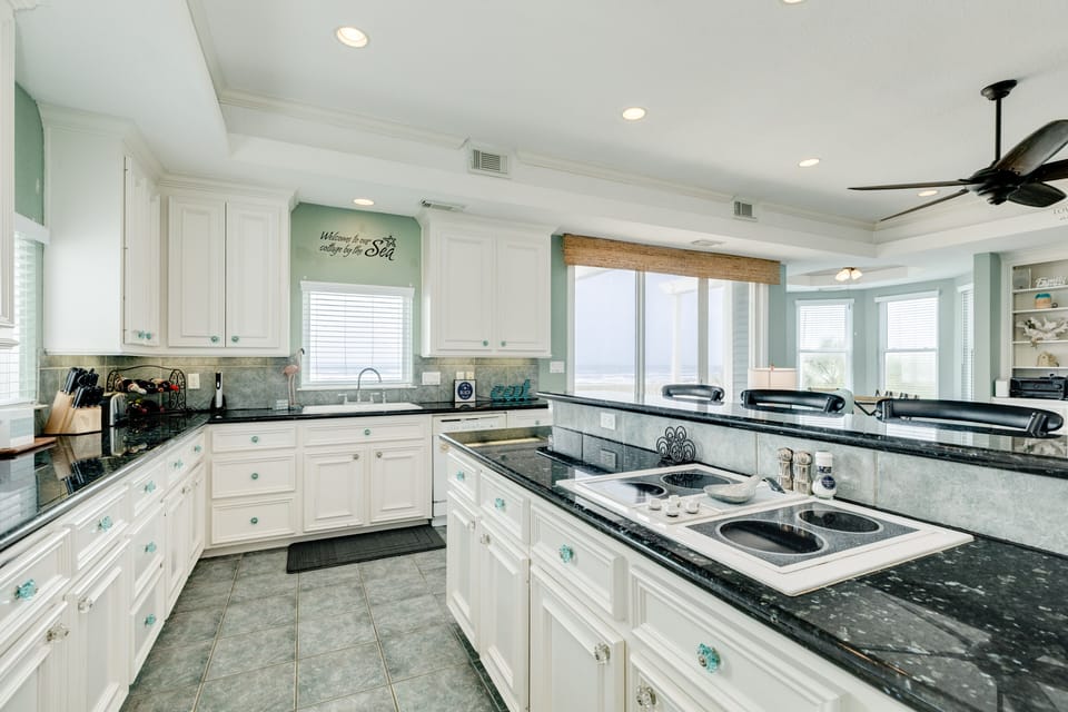 Plenty of prep and storage space - all with views of the beach