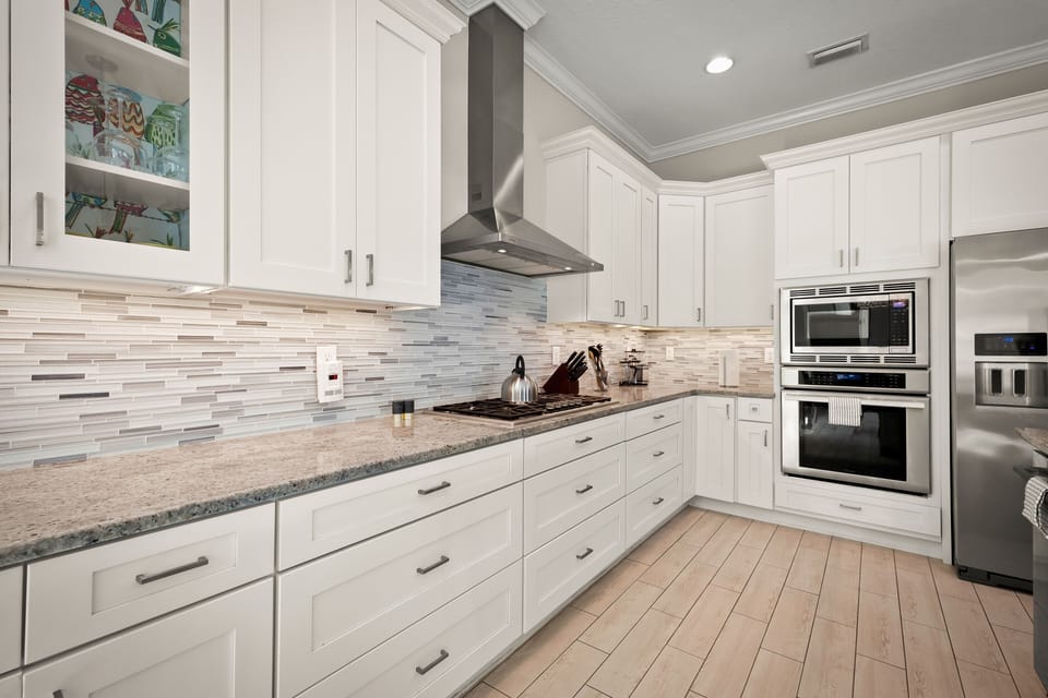 Large open kitchen with all the basic supplies to host the next family gathering