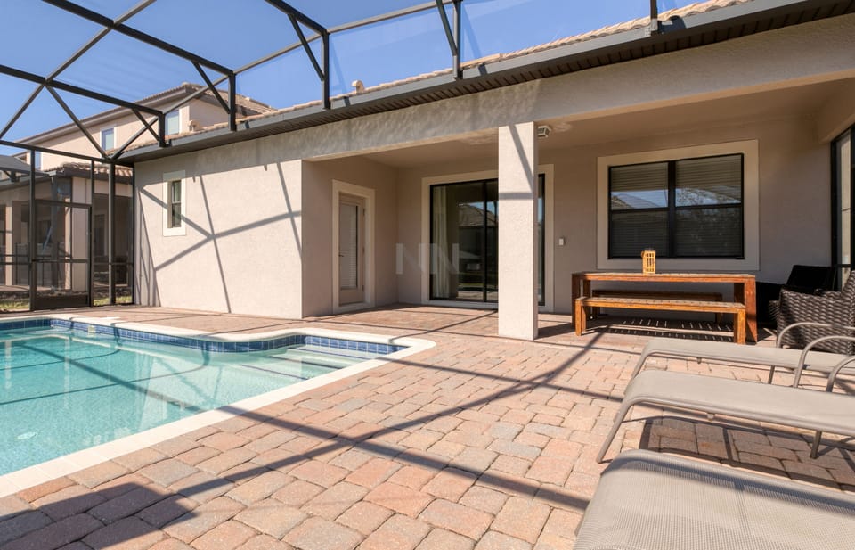 Inviting outdoor patio: Relax on comfortable sun loungers, soak up the sun.