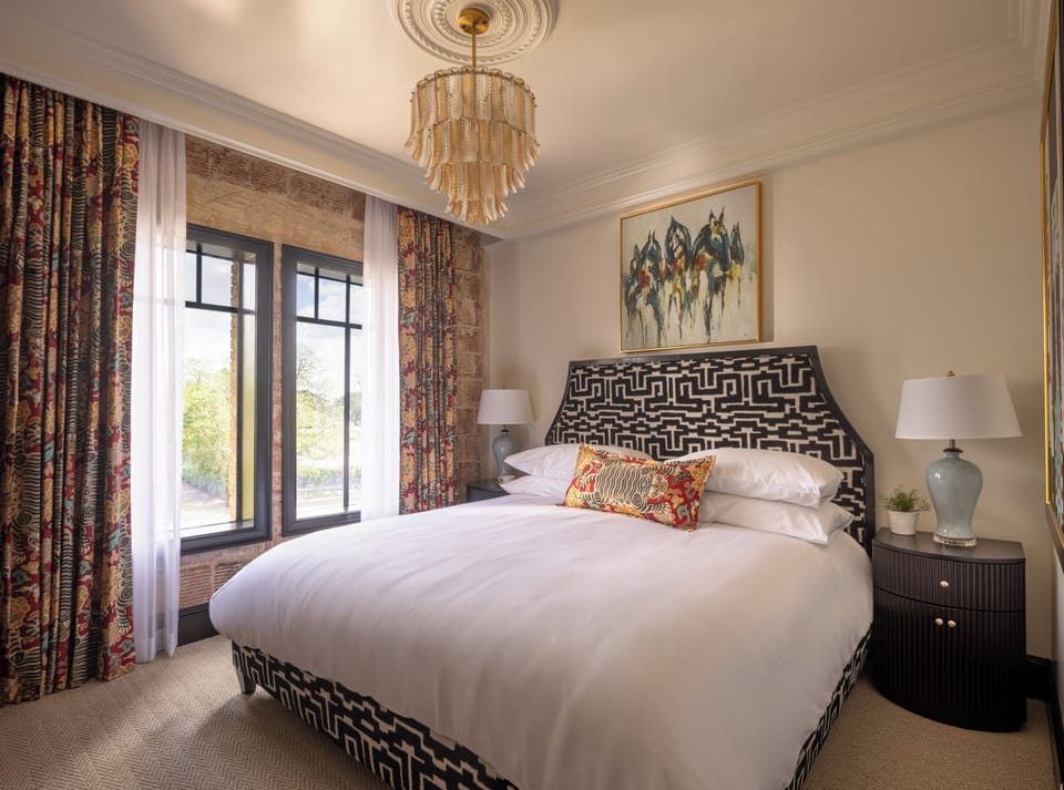 Hypo-allergenic bedding, blackout drapes, iron/ironing board, free WiFi