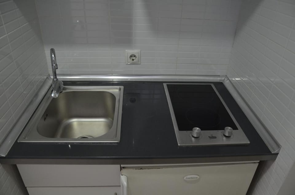 Fridge, microwave, stovetop, cookware/dishes/utensils