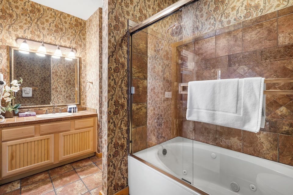 Downstairs Bathroom with Jetted Tub/Shower Combo