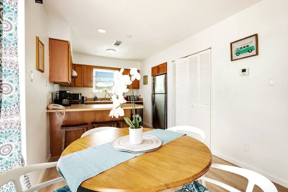 You can enjoy a cup of coffee from our Keurig coffeemaker along with breakfast on our dining table inside or watch the sunset on our balcony with a nice glass of your favorite beverage