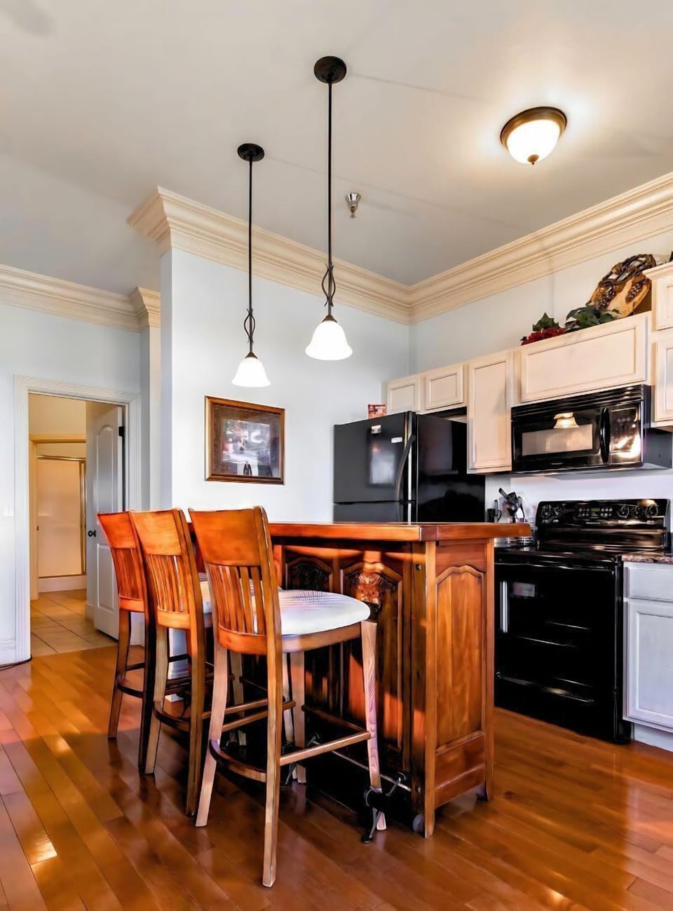 Modern appliances and sleek design await your culinary adventures in this inviting space!