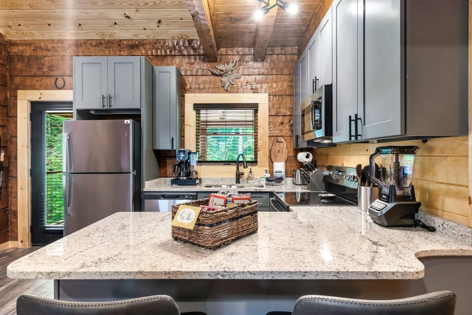 Well stocked kitchen, with microwave, dishwasher and more