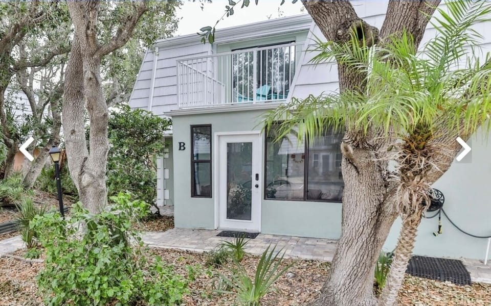 Enclosed front porch area. 