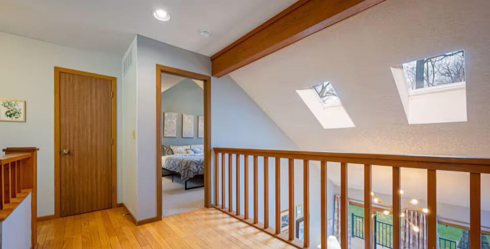 View of primary bedroom from the loft area.