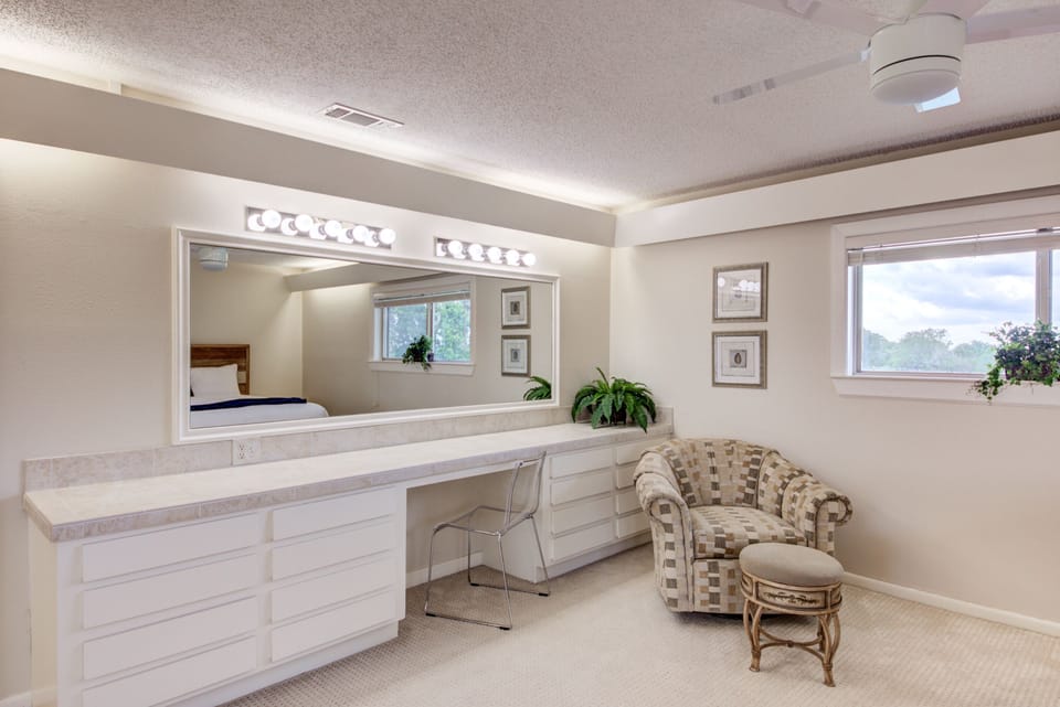 Bedroom 3 make-up area and private access to a full shared bath