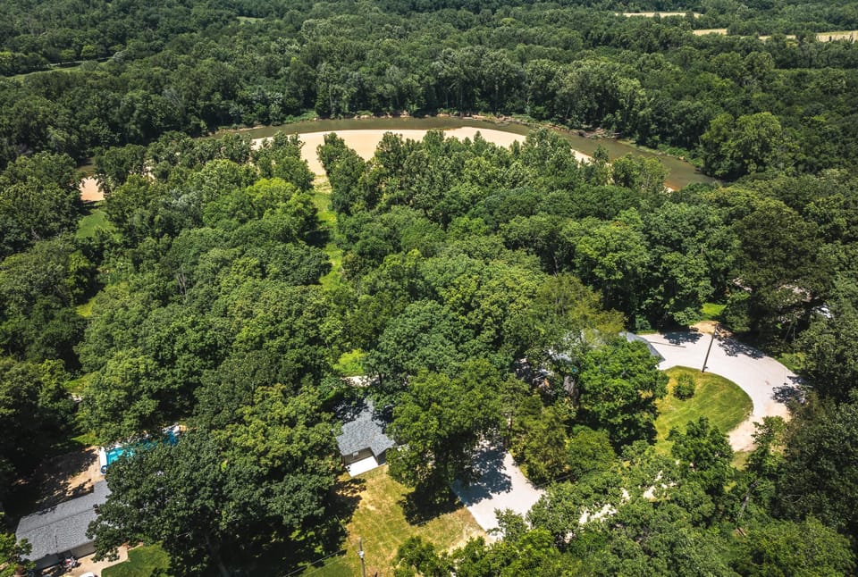 Aerial of 4J Gravel Bar.  The driveway is in between the 2 homes shown, Riverview and Riverbend.  There is a $30 fee per booking and accessed by parking permit