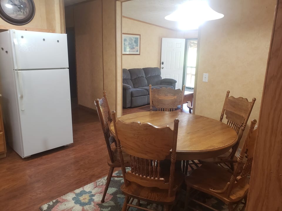 Dining area looking into living room