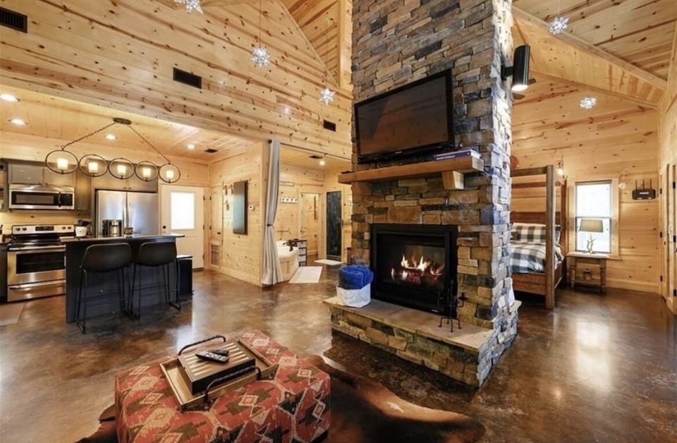 Warm up by the dual-sided fireplace with a glowing LED screen.